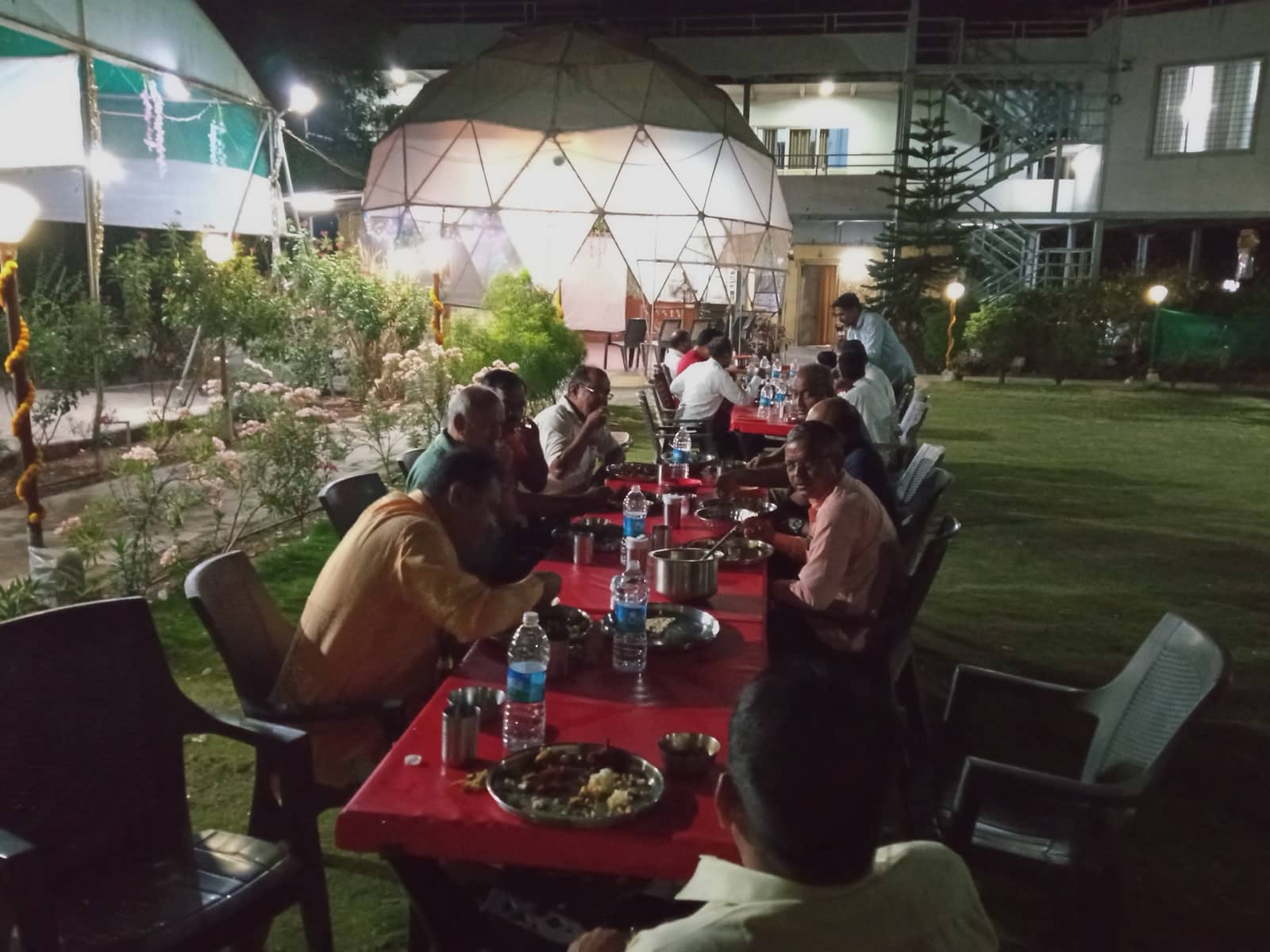 Outdoor dining and unlimited meals at Srushti Farm House